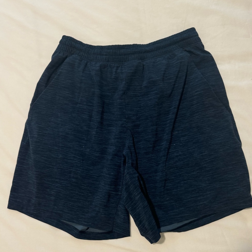 Size M Lululemon Navy Pace Breaker shorts (Inseam 7)